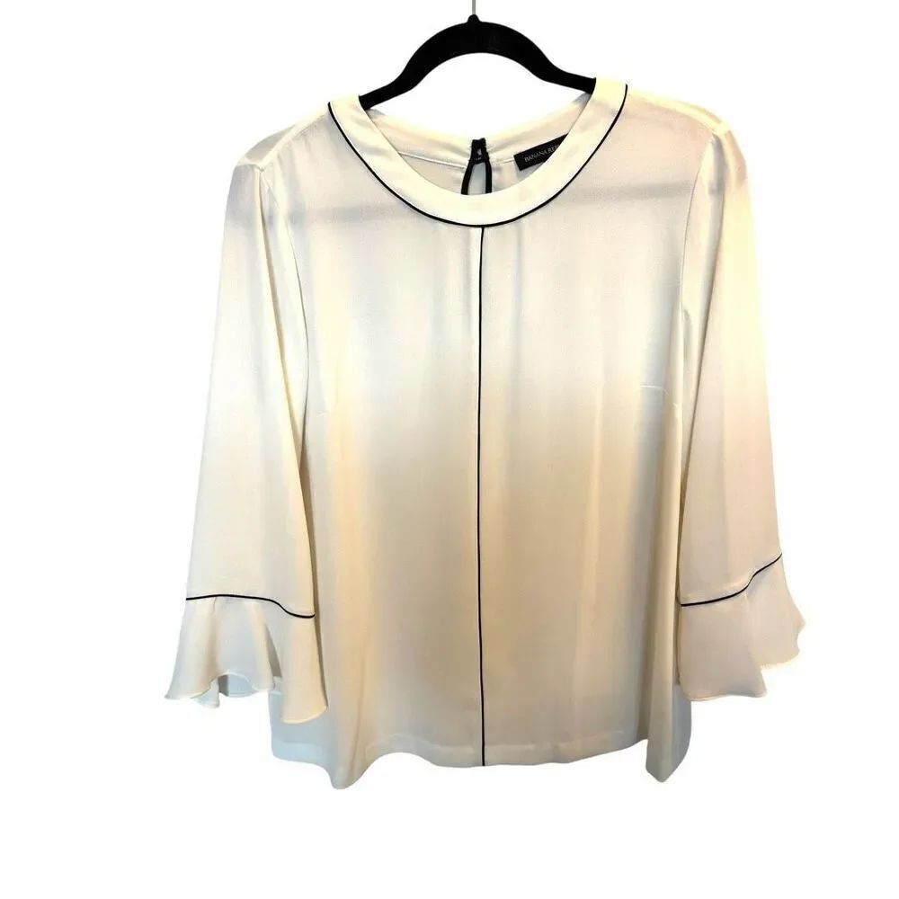 Banana Republic size medium white blouse with flounce sleeve and black piping